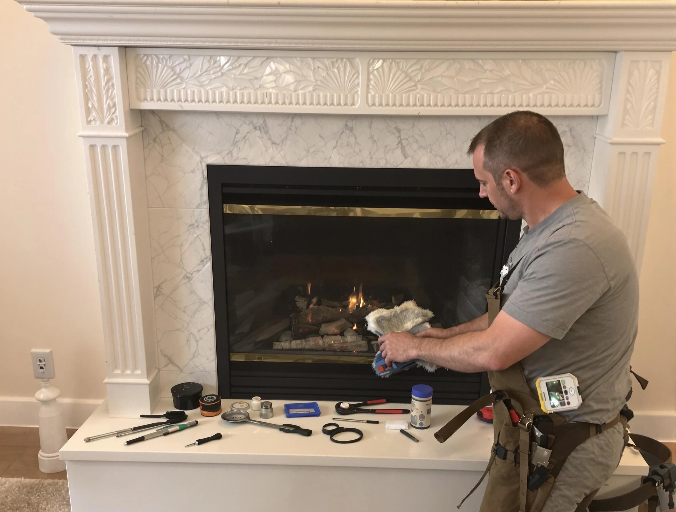 Berkley Chimney Sweep performing fireplace maintenance in Berkley, CO